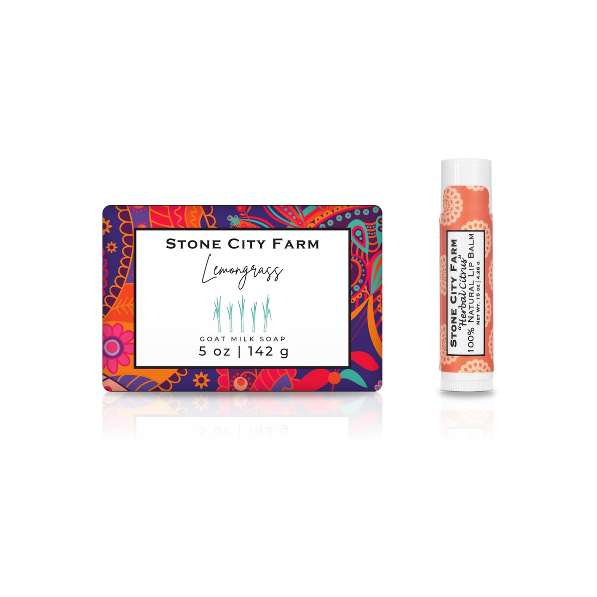 Lemongrass goat milk soap bar beside an Herbal Citrus lip balm