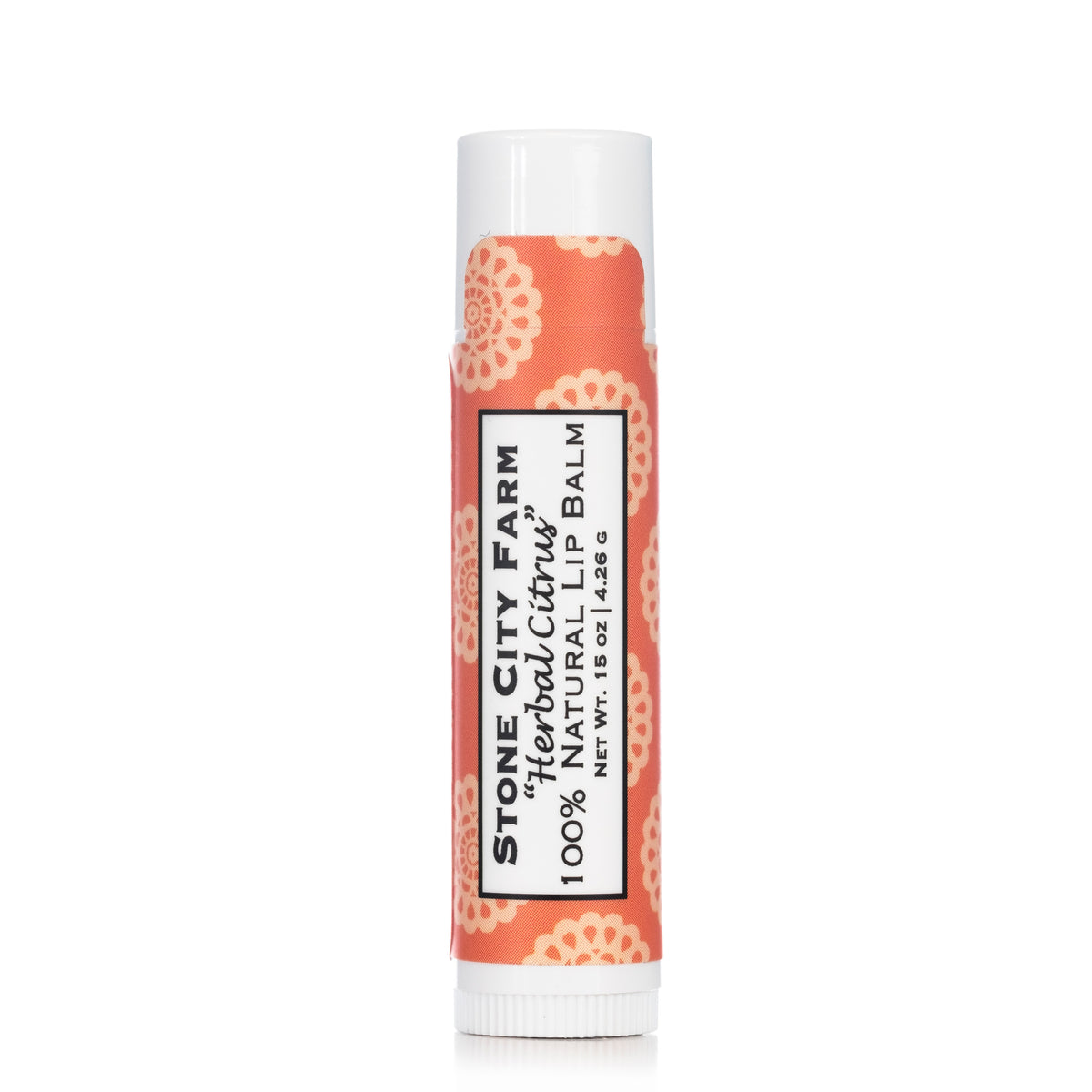Herbal Citrus lip balm tube, original studio photo with reflection