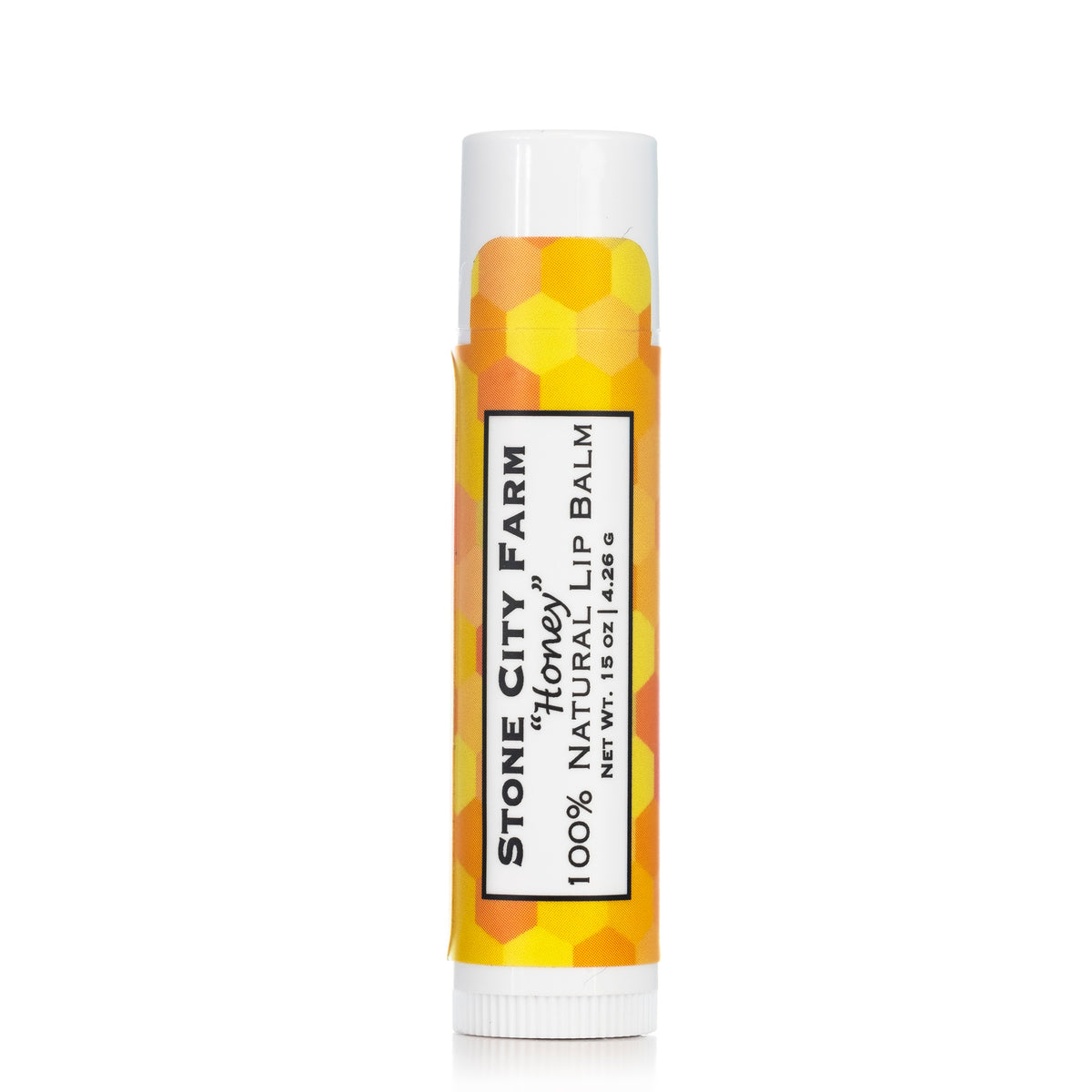 Honey lip balm tube, original studio photo with reflection