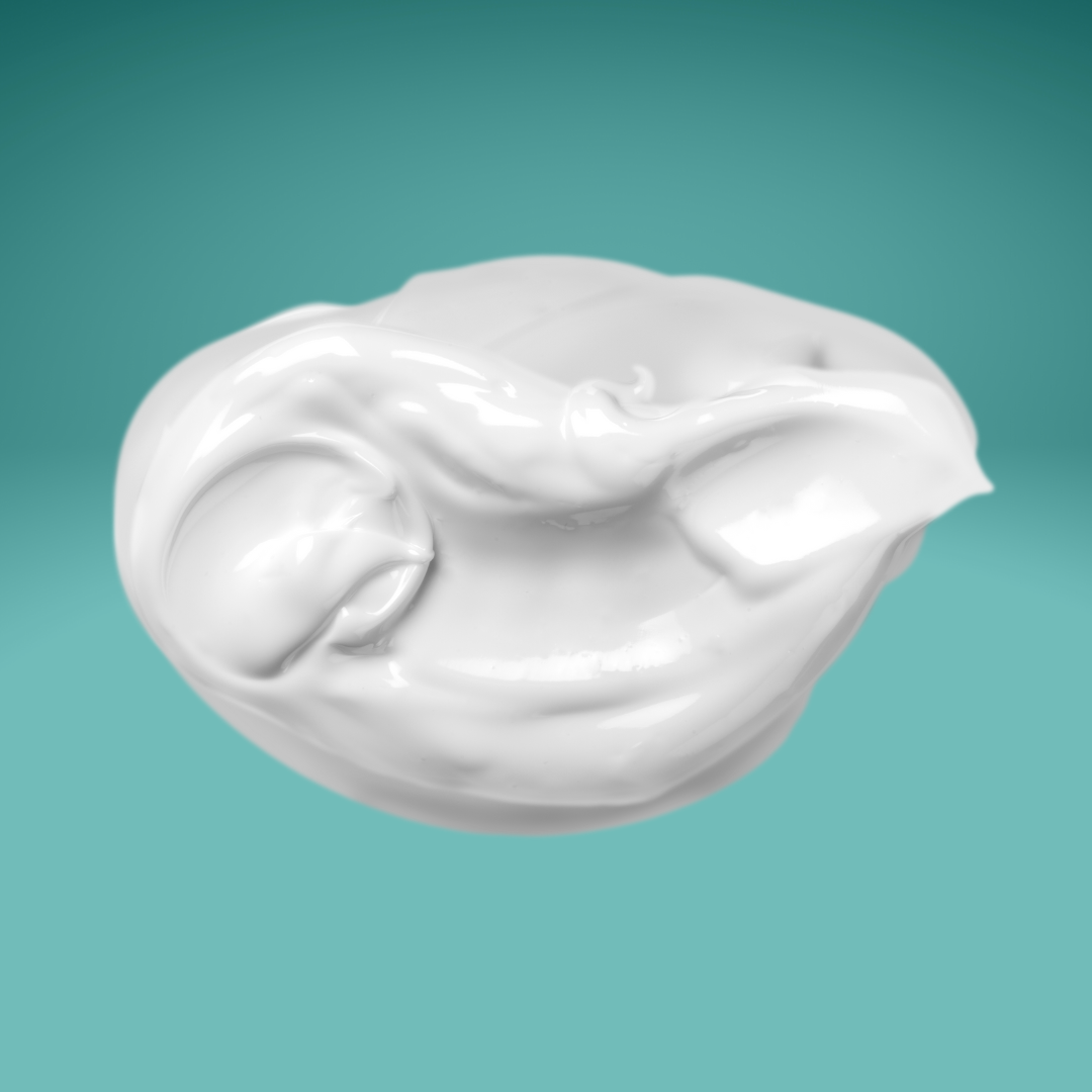 Dollop of Eucalyptus Spearmint goat milk lotion showing its creamy texture