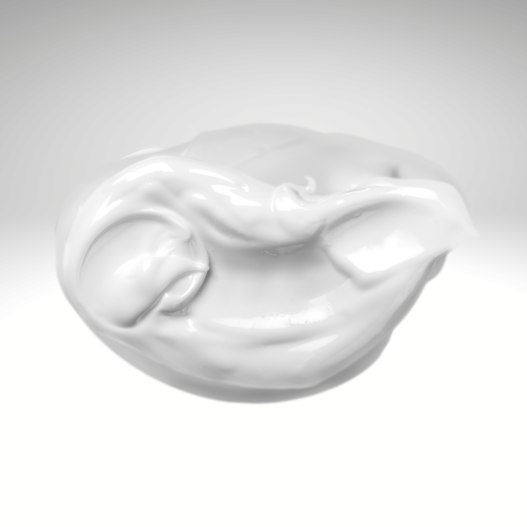 Dollop of Naked unscented goat milk lotion showing its creamy texture